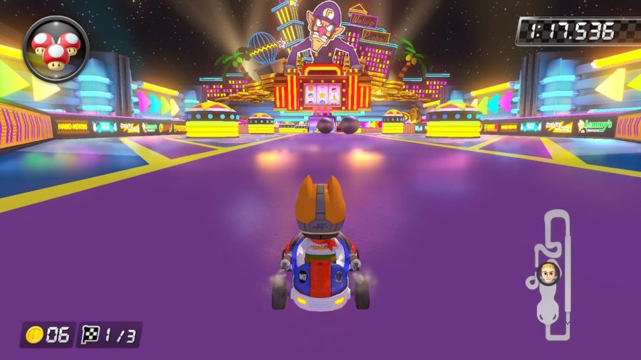 Parte final de DS Waluigo Pinball, com muitas luzes coloridas e uma estátua de Waluigi ao fundo.